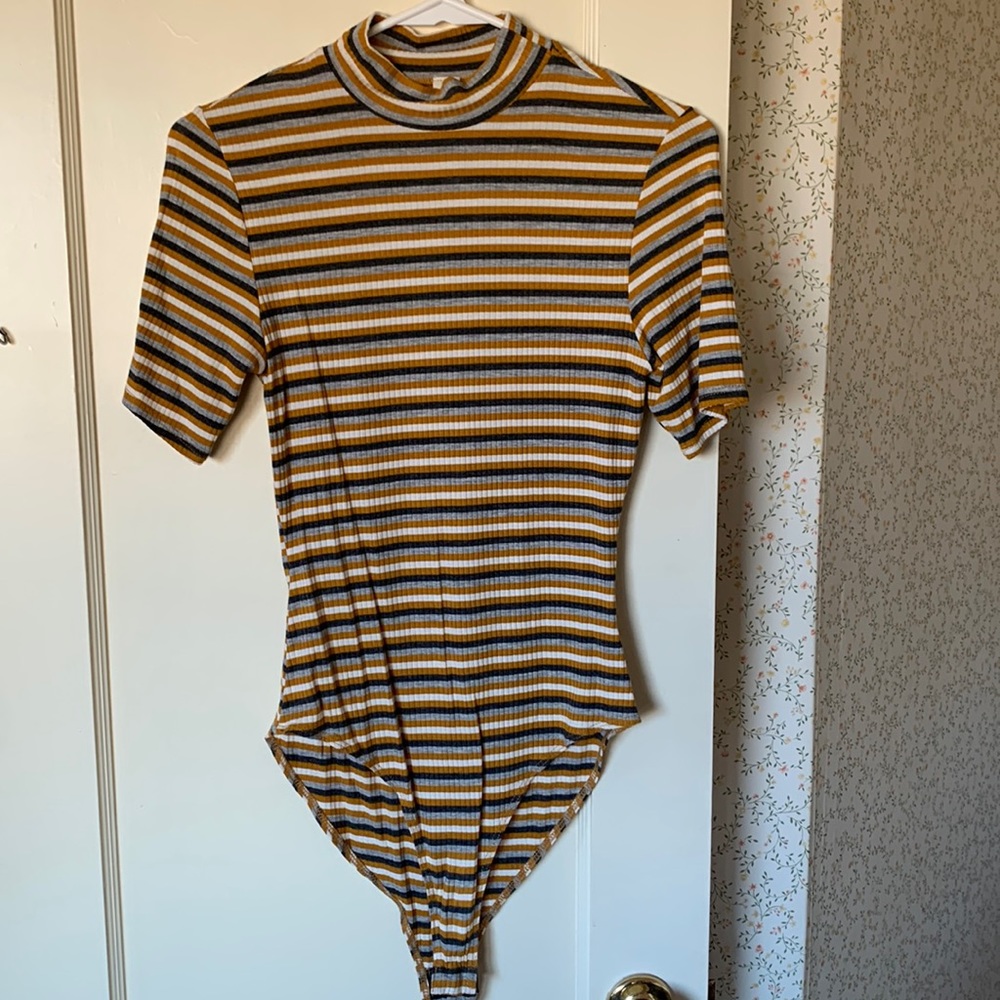 Love Vintage high neck bodysuit. Super slimming and soft. Size small. Worn 1X.